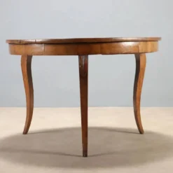 Table ronde élégante avec tiroir et pieds galbés