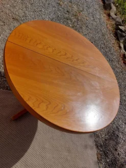 table ronde ou ovale avec rallonge, pied central, design Baumann vintage