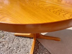 table ronde ou ovale avec rallonge, pied central, design Baumann vintage
