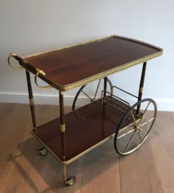 Table roulante en acajou et laiton dans le goût de la Maison Jansen