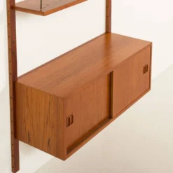 Étagère en teck danois dans le style de Poul Cadovius, années 1960.