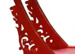 Étagère rouge avec embase sculptée