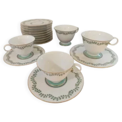 2 tasses à café , 2 tasses à thé et soucoupes