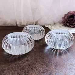 Trio de salières, poivrières, salerons en verre moulé