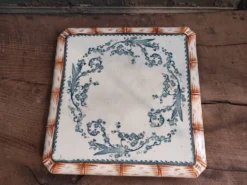 Trivet antique en porcelaine Français
