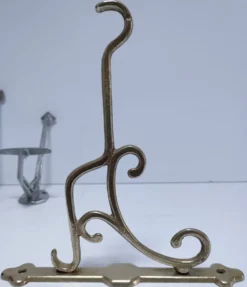 Trois patères laiton chrome aluminium début XXème