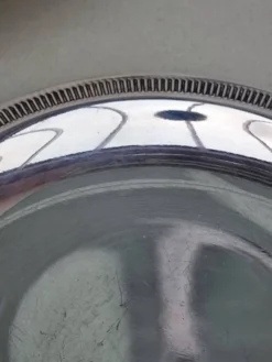 Trois sous-verres en métal argenté