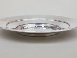 Trois sous-verres en métal argenté
