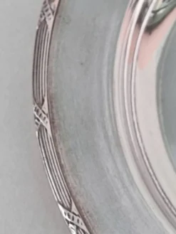 Trois sous-verres en métal argenté