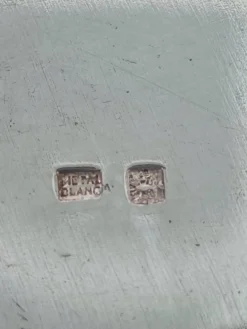 Trois sous-verres en métal argenté