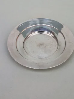 Trois sous-verres en métal argenté