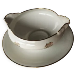 Vends saucière Élégant décor de petites roses dorées,