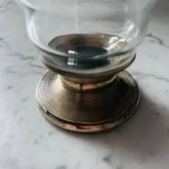 Verre ancien pied métal argenté