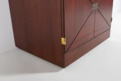 Vintage bar cabinet with brass markings