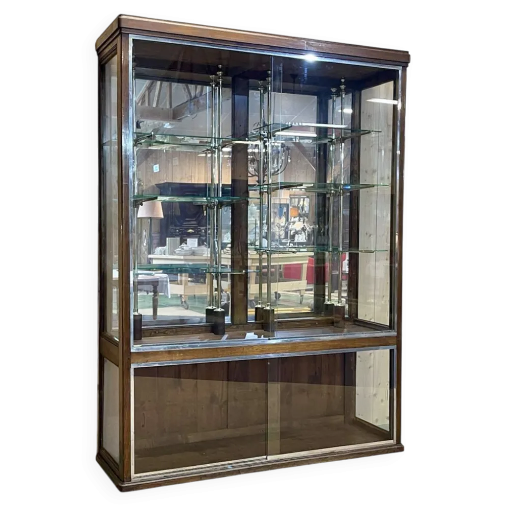 Vitrine de magasin début XXème en chêne à portes coulissantes